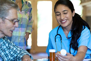 nurse with an older patient